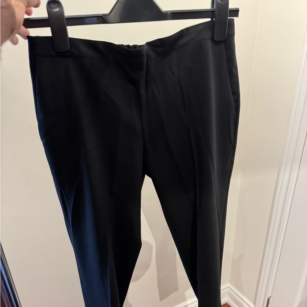 Black wool 6397 designer. Elastic waist. Skinny leg. Great condition